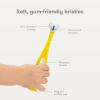 imageFrida Baby TripleAngle Toothhugger Training Toddler Toothbrush  Toddler Toothbrush 2 Years and Up Cleans All Sides at Once  2 Pack Yellow  PinkYellow  Blue