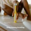 imageFrida Baby TripleAngle Toothhugger Training Toddler Toothbrush  Toddler Toothbrush 2 Years and Up Cleans All Sides at Once  2 Pack Yellow  PinkYellow