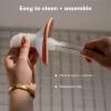imageFrida Mom 2in1 Manual Breast Pump with HandsFree Silicone Suction Cup Milk Collector Wireless Ergonomic Handle and SoftFeel Flange for Breastfeeding21MM Flange